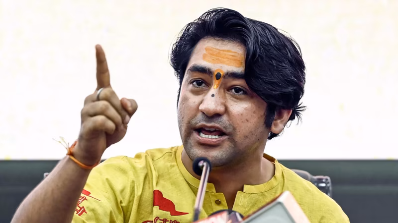 Congress slams video of Bageshwar Dham head on govt plane, cop touching feet